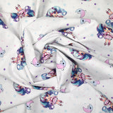 Coton imprimé kawaii bleu et rose fond blanc