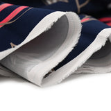 Satin de coton élasthanne imprimé expert du vent fond bleu foncé