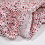 Cotton print pink floral white background