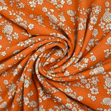 Viscose imprimée printanière blanc cassé fond orange