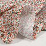 Coton imprimé champêtre orange fond blanc