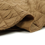 Jersey matelassé triangle fond beige