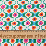 Viscose imprimée agitation verte et orange fond blanc