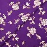 Popeline de coton imprimée ornemental marron fond violet