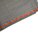 100% Prince of Wales wool suit fabric, black, red, off-white background