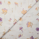 Popeline de coton imprimée fleurs pastel mauve et pêche fond blanc
