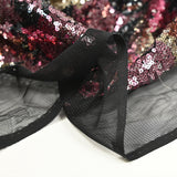 Tulle sequin jeune pousse fuchsia et beige fond noir