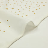 Maille fantaisie imprimée triangle doré fond blanc cassé