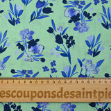 Popeline de coton imprimée fleur bleu roi fond vert jade