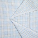 Popeline polycoton à carreaux marron fond bleu ciel