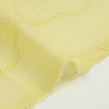 Broderie anglaise festonnée jaune pâle