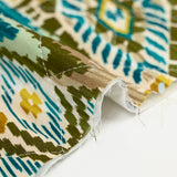 Viscose matelassée double face ikat et cachemire vert et ocre au mètre