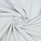 Popeline polycoton jacquard à carreaux gris anthracite fond blanc