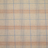Woven cotton dyed sky and brown checks mottled beige background
