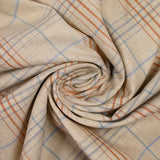 Woven cotton dyed sky and brown checks mottled beige background