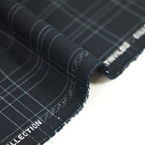 Tissu tailleur sergé laine mélangée à carreaux blanc fond marine