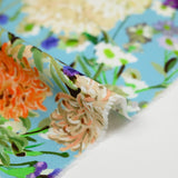 Popeline de coton imprimée champêtre orange fond bleu