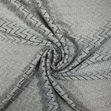 Dentelle polyester chevron gris fond argent