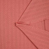 Jersey pointelle 100% coton corail