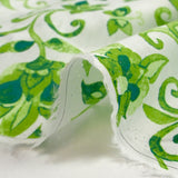 Voile de coton imprimé jardin persan vert fond blanc