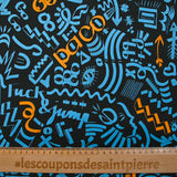 Light cotton satin with blue and orange graffiti print, black background
