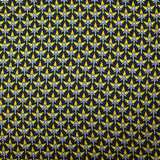 Forro de sarga de viscosa con estampado gráfico amarillo y fondo azul medianoche.
