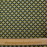 Forro de sarga de viscosa con estampado gráfico amarillo y fondo azul medianoche.