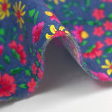Cotton corduroy printed with wind of flowers, barbel blue background