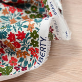 Coton liberty ® Sweet May lie de vin au mètre