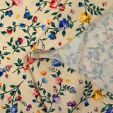 Satin polyester imprimé herbier fond beige clair