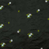Satin de polyester brodé fleurs vert d'eau fond noir