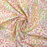 Coton imprimé contour de fleurs fond écru