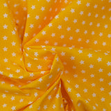 Coton imprimé étoile 1cm jaune