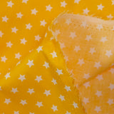 Coton imprimé étoile 1cm jaune
