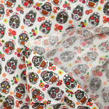 Coton imprimé Día de Muertos fond blanc