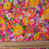 Viscose imprimée fleurs orange fond fuchsia