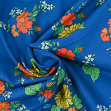 Coton liberty ® Tropical Sprig fond bleu au mètre