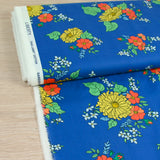 Coton liberty ® Tropical Sprig fond bleu au mètre