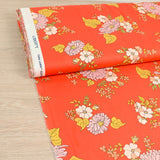Coton liberty ® Tropical Sprig fond corail au mètre