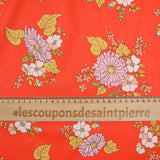 Coton liberty ® Tropical Sprig fond corail au mètre