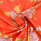 Coton liberty ® Tropical Sprig fond corail au mètre