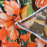 Voile de viscose imprimé Hawaiian hibiscus orange corail fond marron
