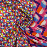 Viscose imprimée cercle vintage fuchsia fond violet