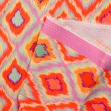Viscose imprimée losange orange fond parme