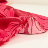 Viscose imprimée grandes fleurs fond bordeaux