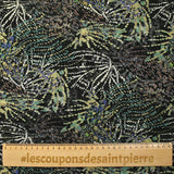 Mousseline imprimée lurex feu d'artifice vert sauge fond noir