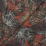 Mousseline imprimée lurex feu d'artifice brique et ocre fond noir