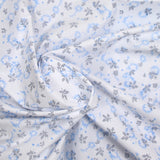 Popeline polycoton imprimée camouflage bleu