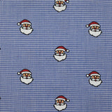 Coton tissé teint imprimé le père Noël fond blanc et bleu