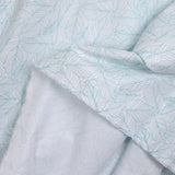Popeline polycoton imprimée feuillages vert fond blanc